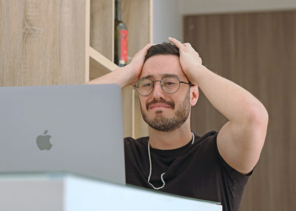 failed investor head in hands